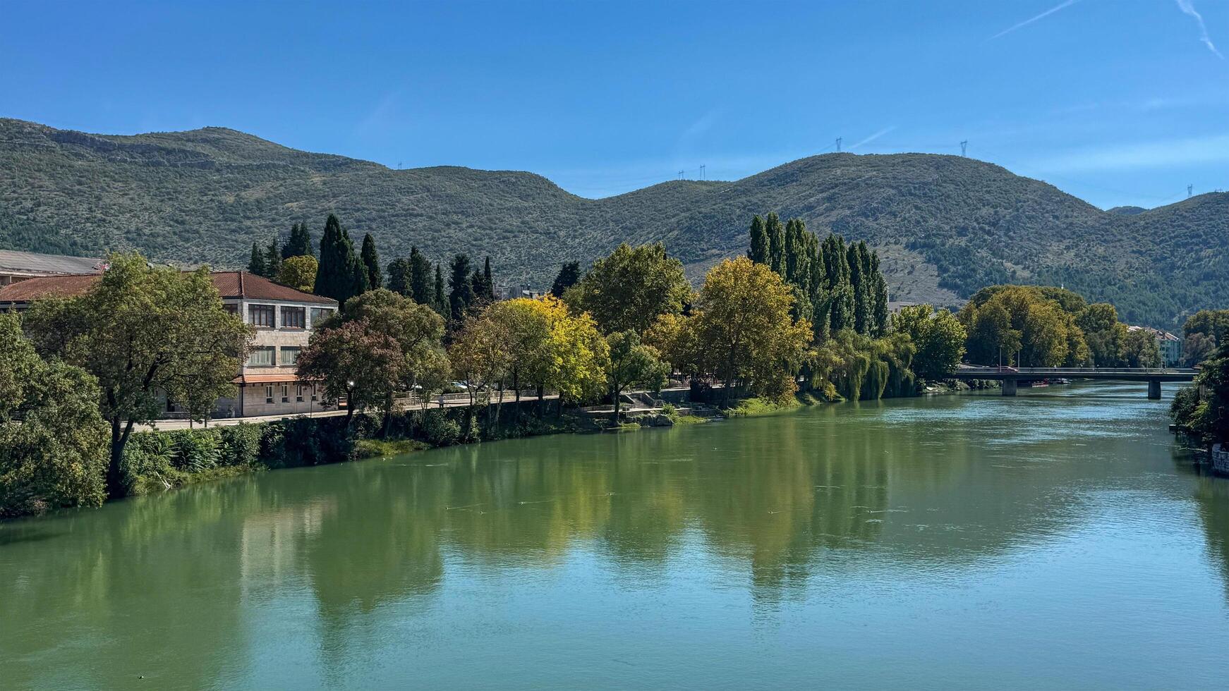 view of the bank of the Trebisnica River. Trebinje, Bosnia and Herzegovina, 2 October 2024 photo