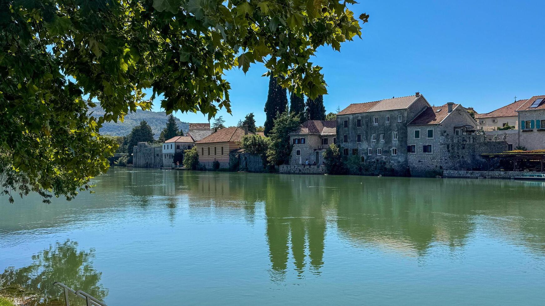 A cityscape from the Trebisnica River. Old Town.Trebinje, Bosnia and Herzegovina, October 2, 2024 photo