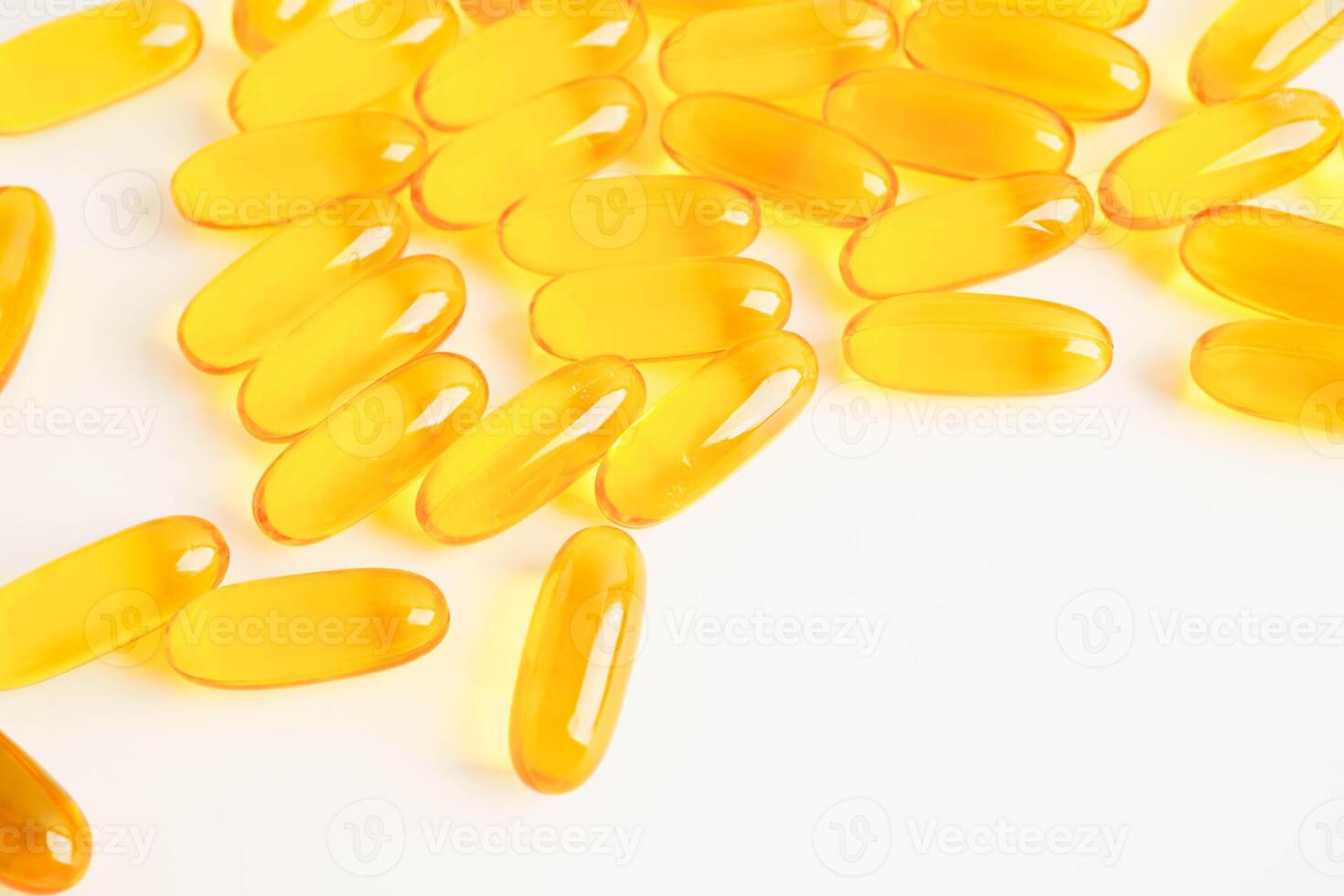 Fish oil or Cod liver oil gel in capsules with omega 3 vitamins, supplementary healthy food. photo