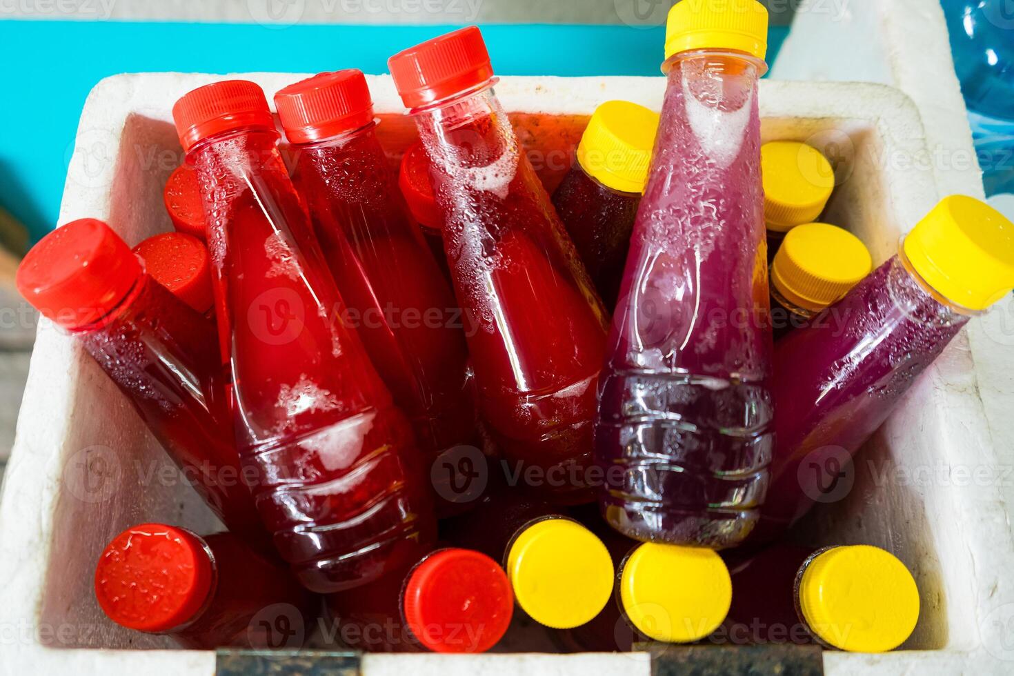 Assorted Beverages Chilling in Ice Box for Ultimate Refreshment on Hot Days at Nonthaburi, Thailand photo