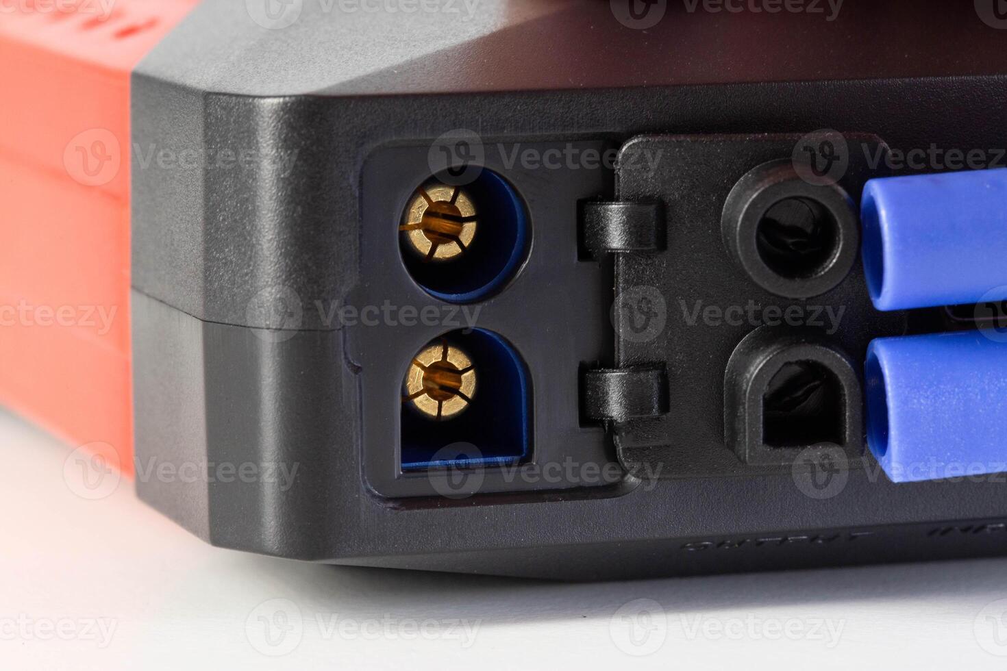 Connectors in the power bank for connecting clamps to start the engine, close-up photo