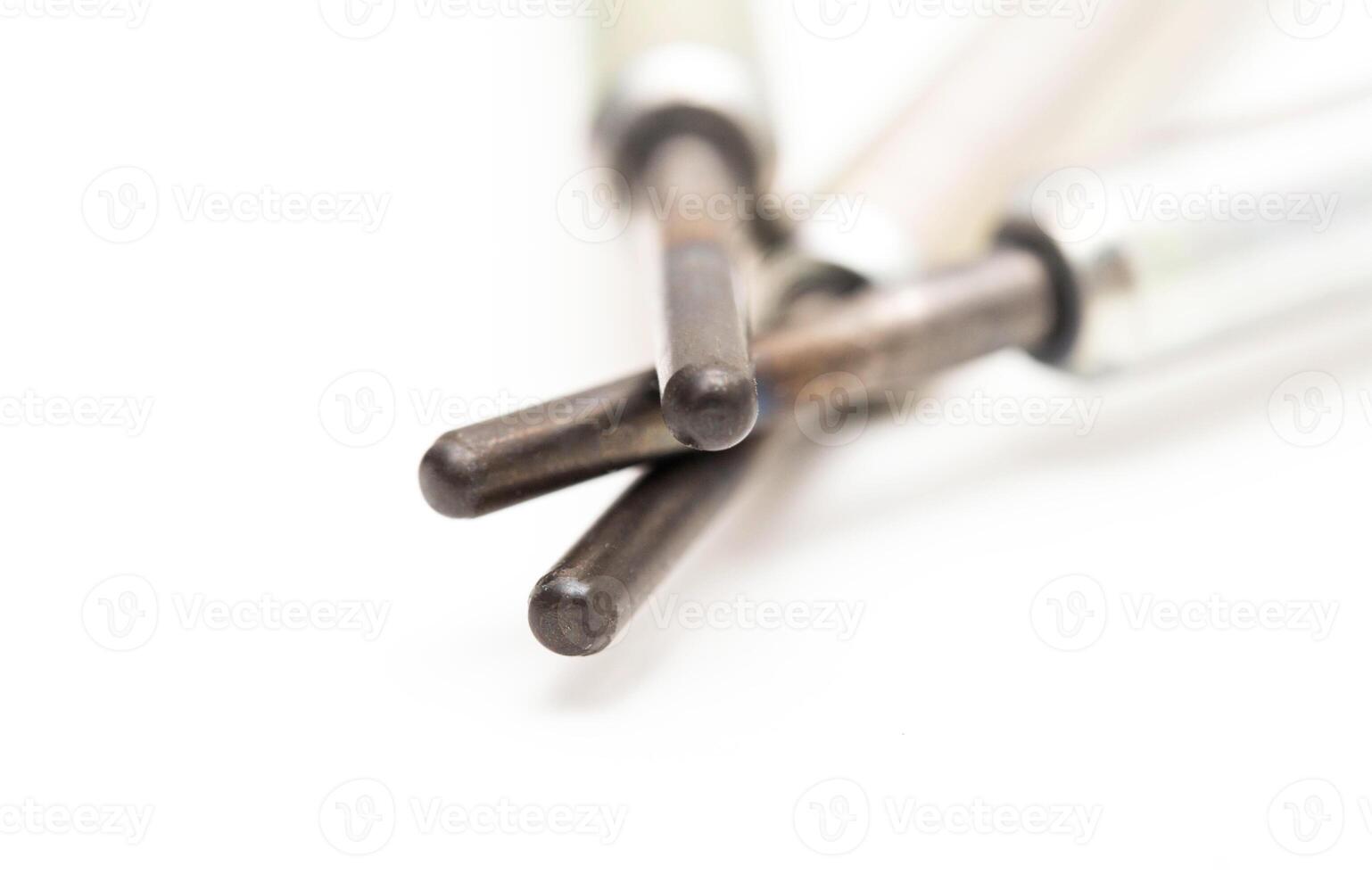 Modern ceramic glow plugs for warming up a diesel engine before starting. White background, isolate. Macro photo