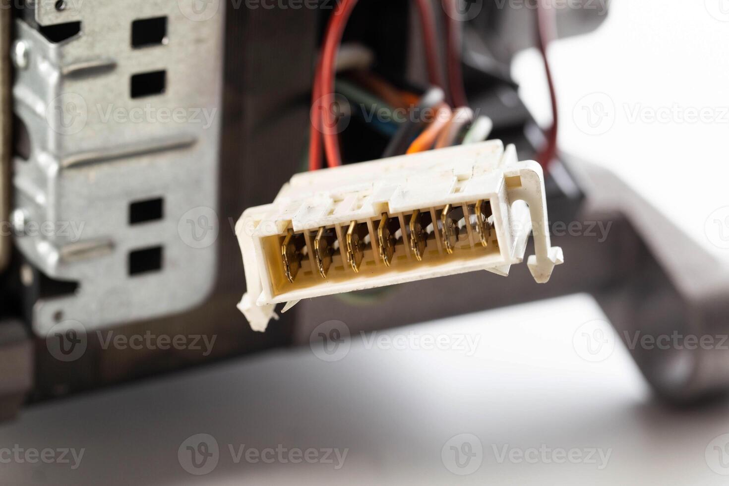 contamination of the electrical contacts in the electrical motor connector of the washing machine, close-up photo