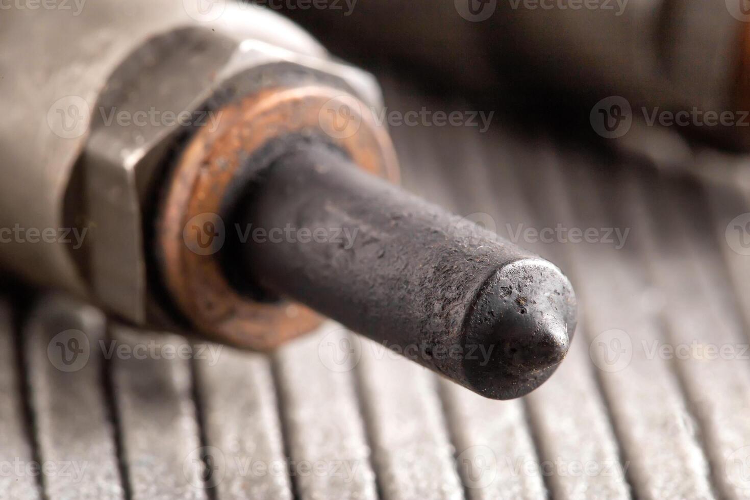Needles and nozzles on nozzles from a diesel engine. Deterioration of the fuel system of the car, macro photo