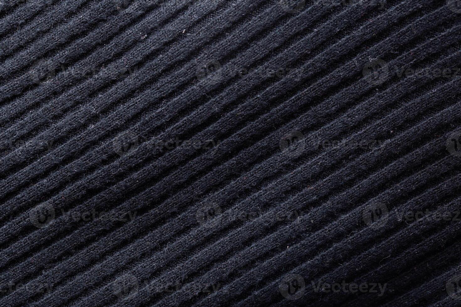 Black sweater in a line, background, macro, traditional photo