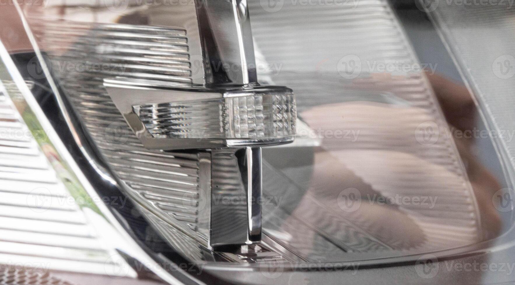 Economical and modern car headlight with LED adaptive light. Close-up, illuminate photo