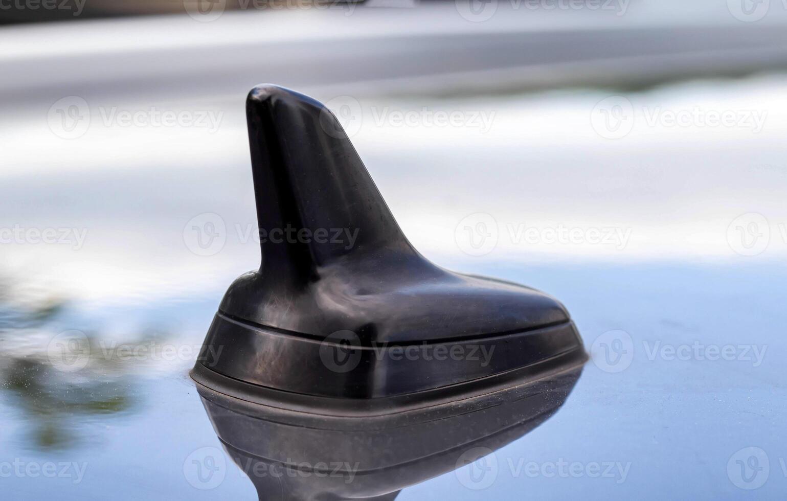 Modern car antenna on the car roof, system GPS. Close-up photo
