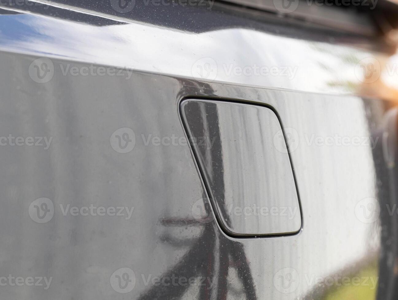 plug in the gray bumper of the car, macro photo