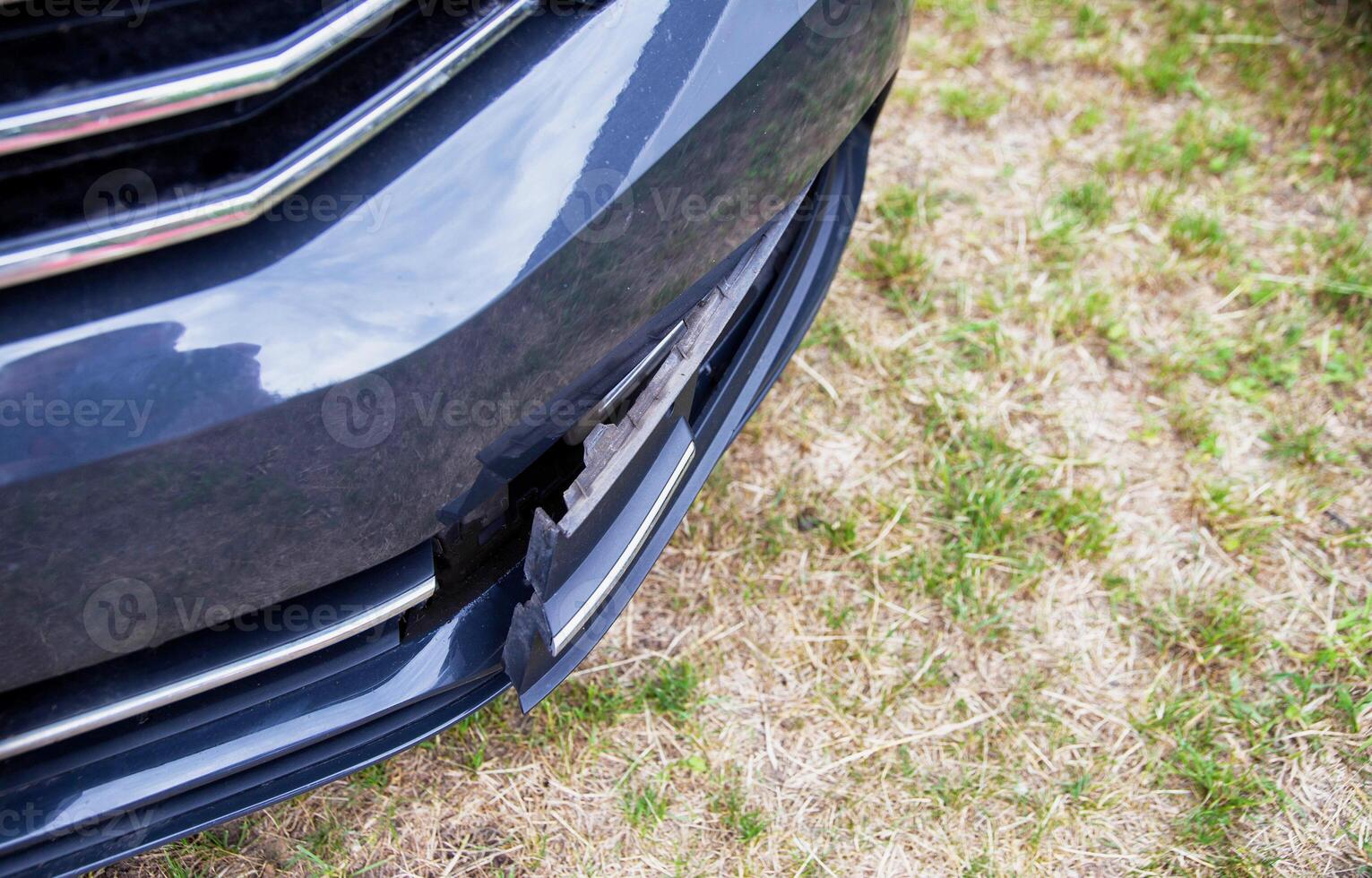 Disassembling and removing the fog lamp from a car to replace a burnt out light bulb. Close-up photo