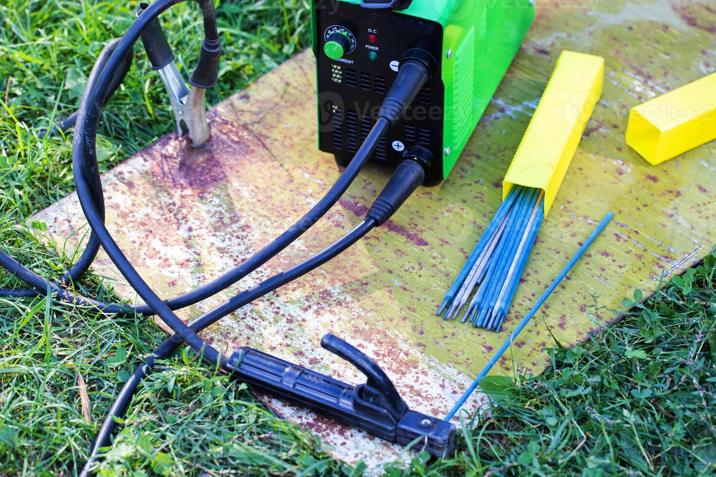 Manual welding machine and a set of electrodes for seam contact welding. Safety precautions during welding, industry photo