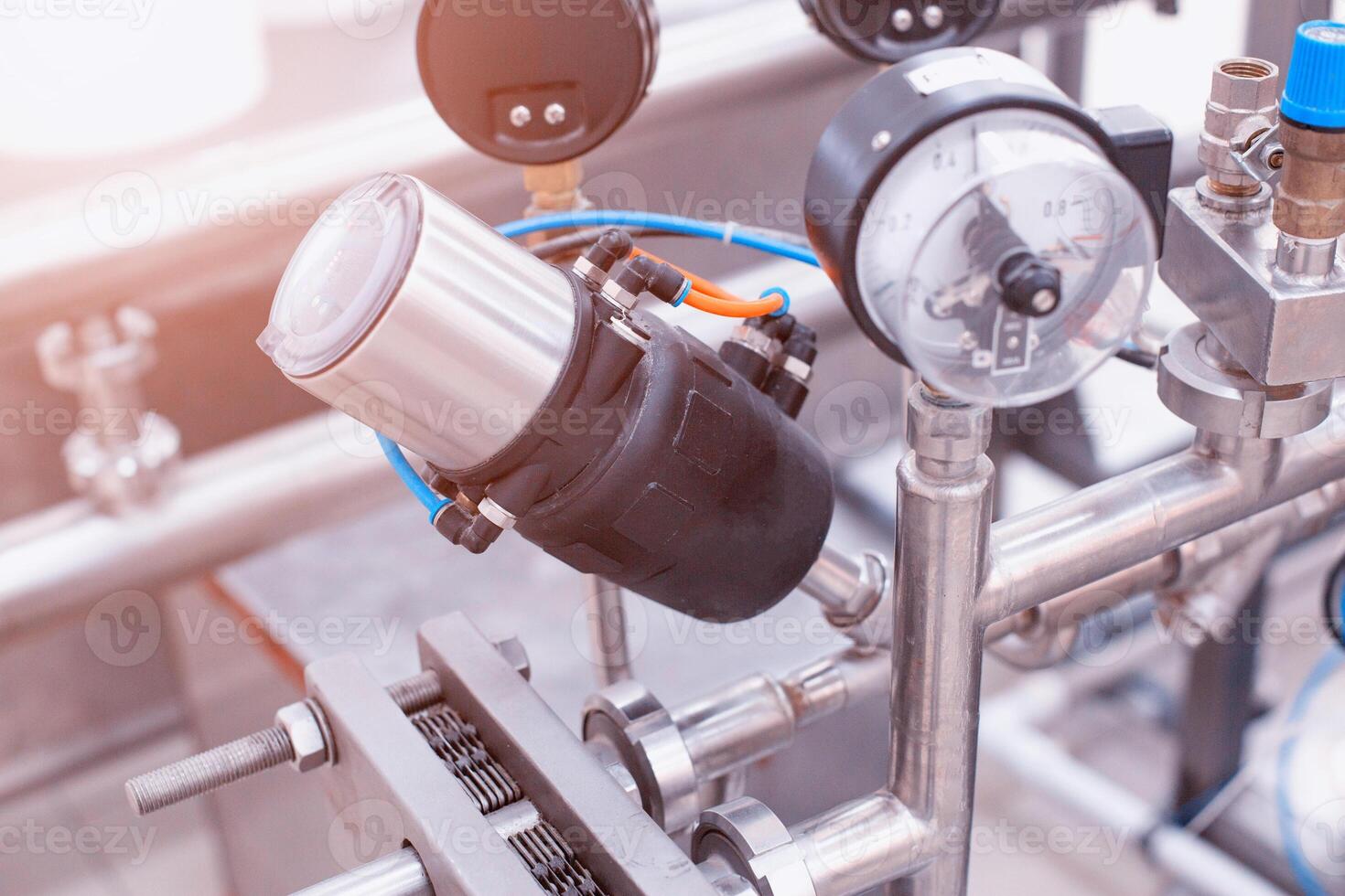 Production gauges and gauges. Oil and water separator, air purification with pressure relief valve, background, air preparation unit photo