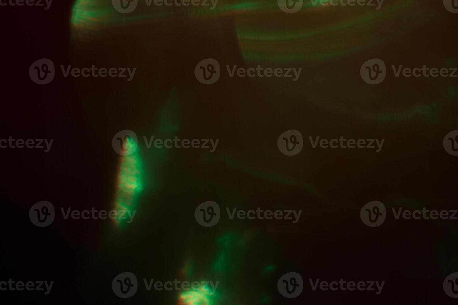 Blurred lens flare. Defocused colorful lights. Shiny glowing spots, abstract background and texture photo