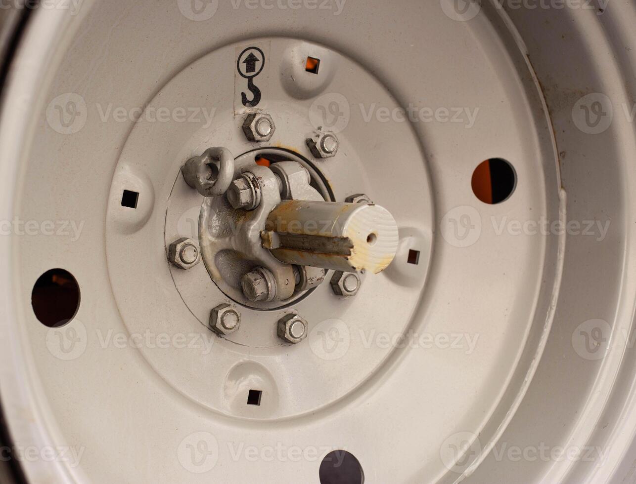 rear metal wheel disc from tractor, background, agriculture photo