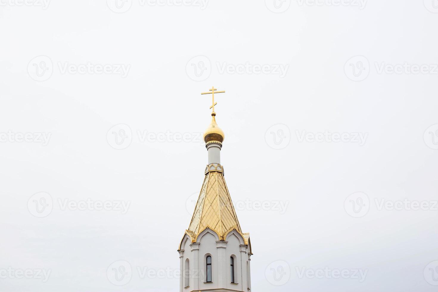 Beautiful church with a golden dome and bells against the sky, architectural, copy space, historic photo