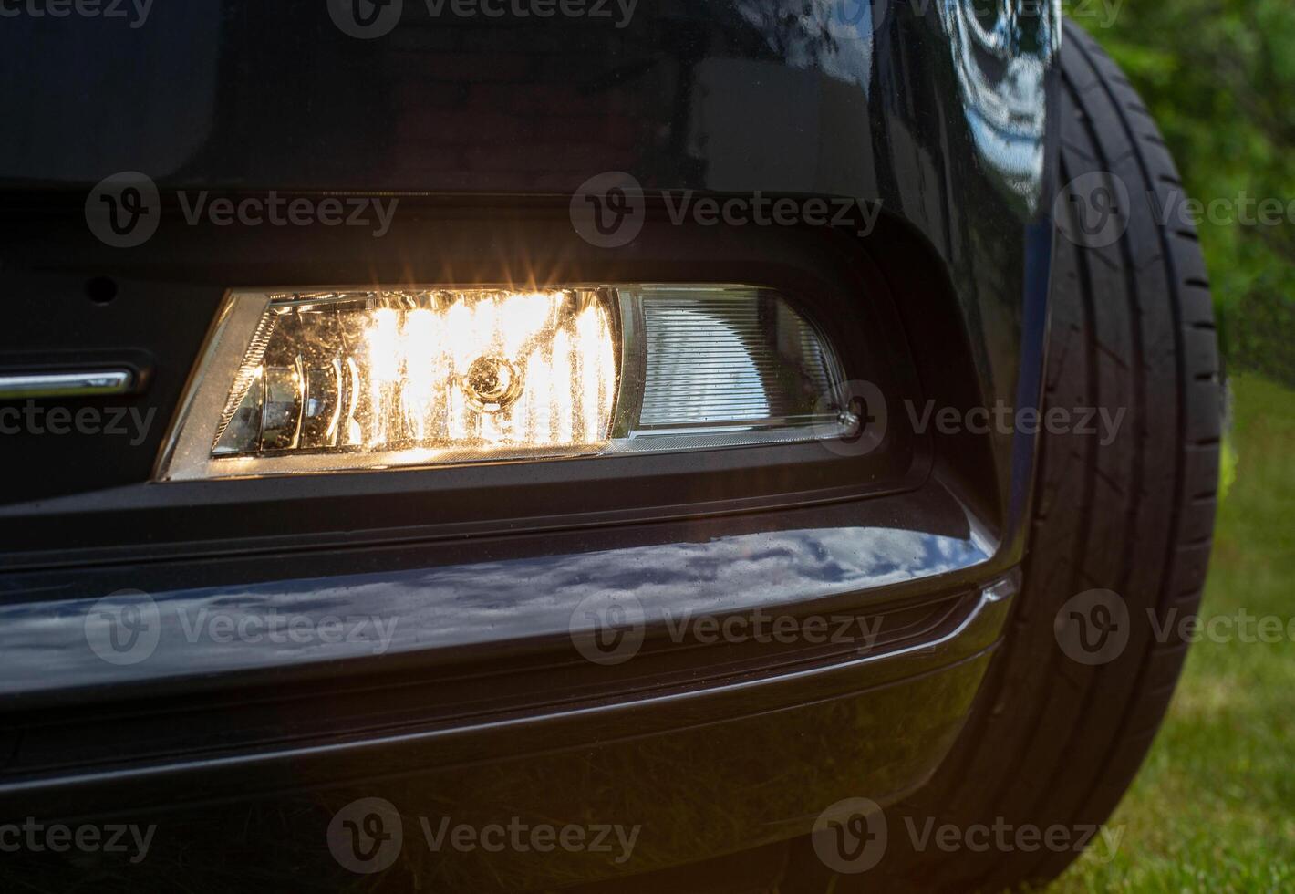 Fog lamp for adaptive illumination of the roadside in the dark when turning the steering wheel. Close-up, technology photo