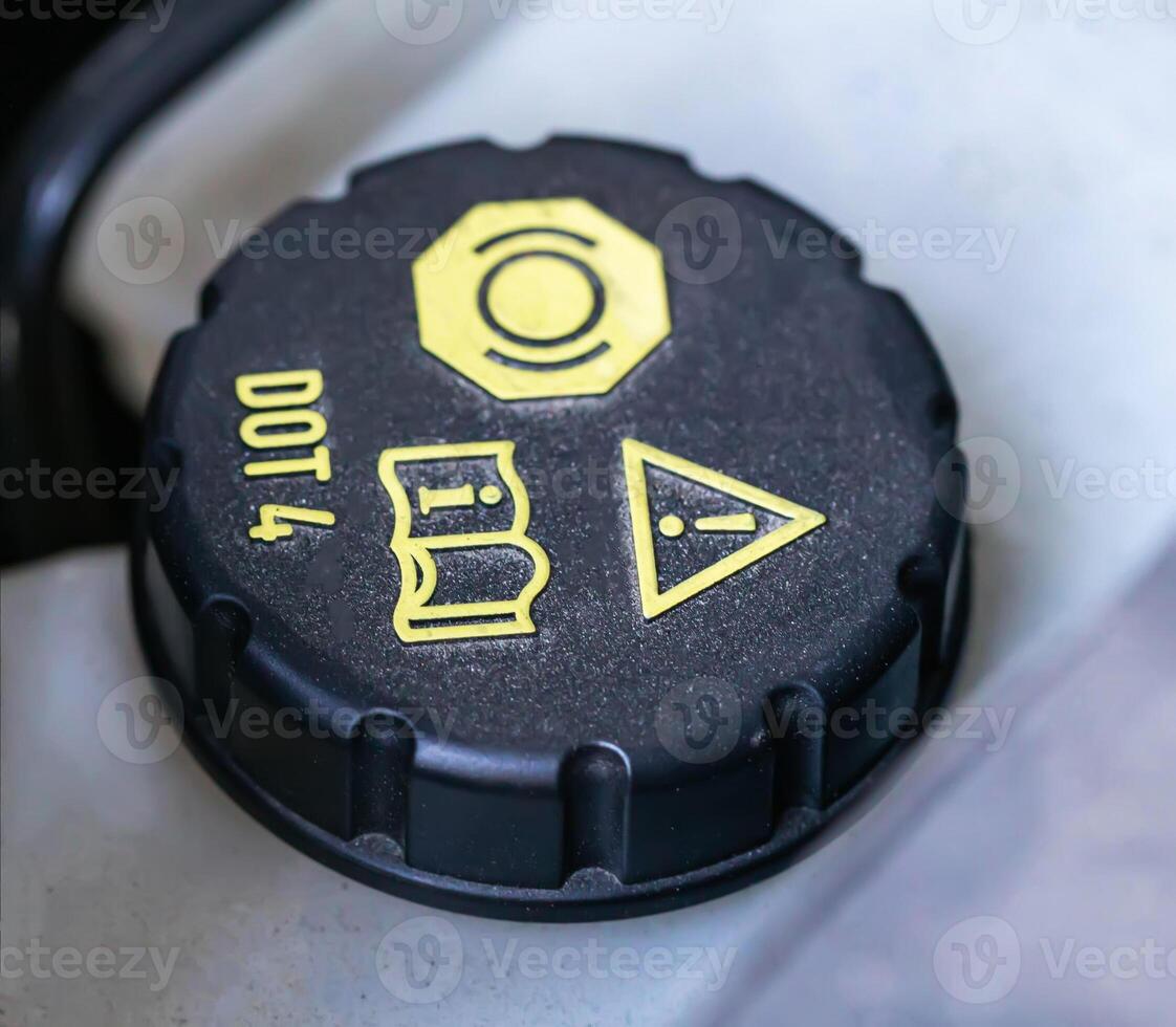 Car brake fluid reservoir for brake system, macro photo