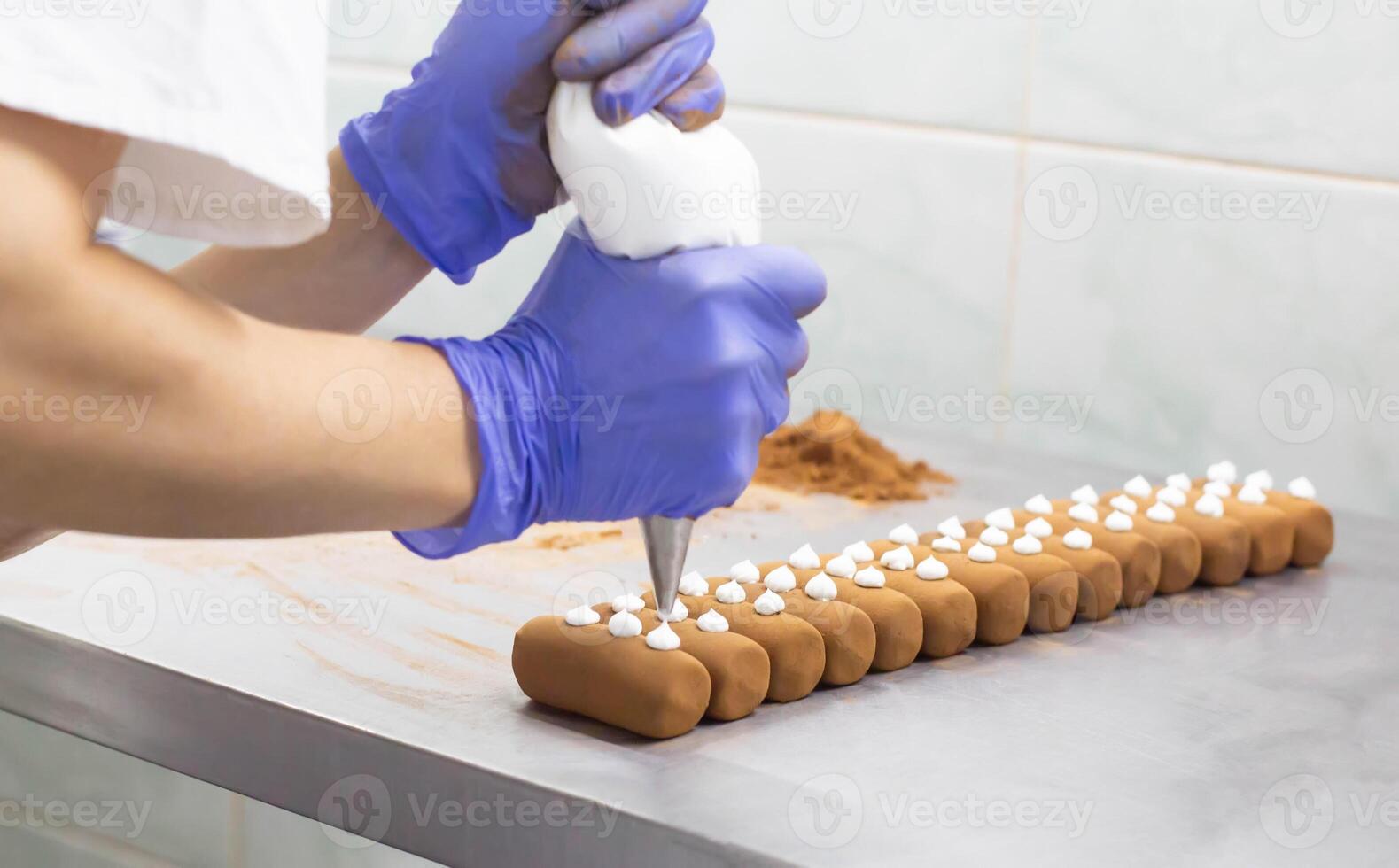 Confectionery production of chocolate cake potato with cocoa, hand made cake photo