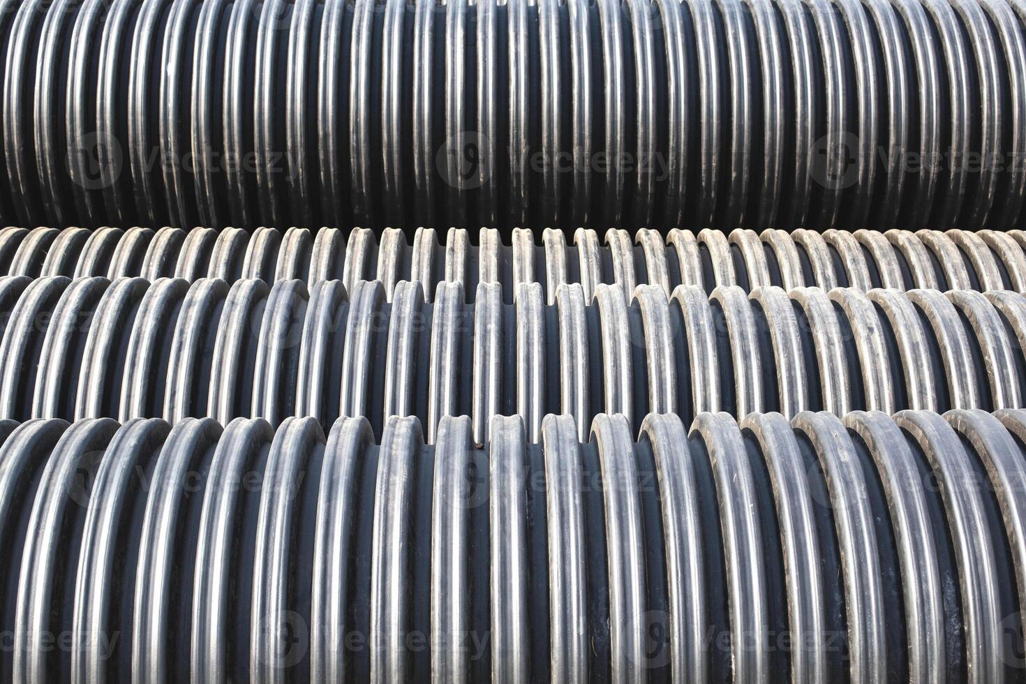 Modern polypropylene pipes for conducting heating mains underground. Durable and anticorrosive properties of water pipes, drainage system photo