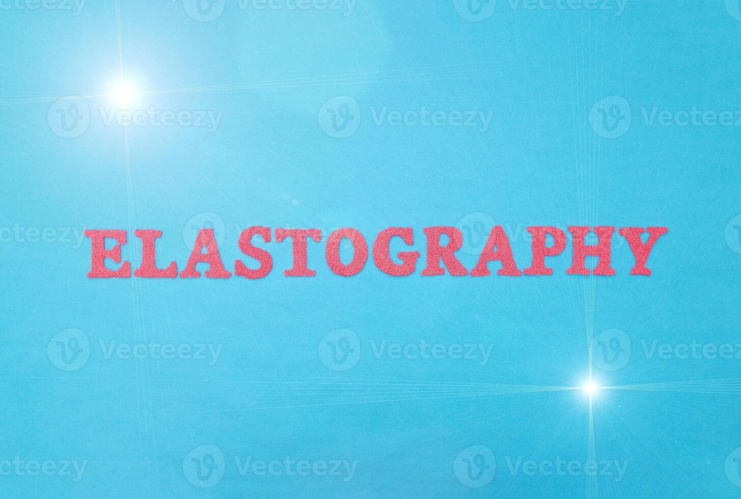 The word elastography in red letters on a blue background. The concept of a new modern procedure for ultrasound examination of soft tissues, organs of a person at an early stage of a tumor, cancer photo