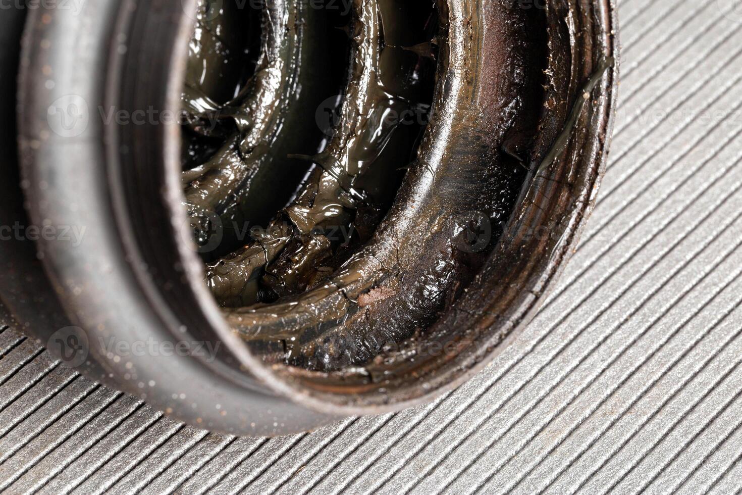 Old CV joint boot providing protection and dirt ingress into the constant velocity joint, macro photo