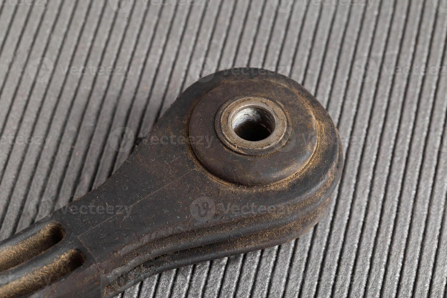 Spare part from car suspension, stabilizer link. Macro photo