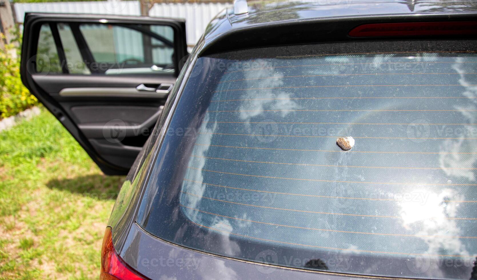 Bird droppings on car glass, damage from droppings to a car. Copy space for text photo