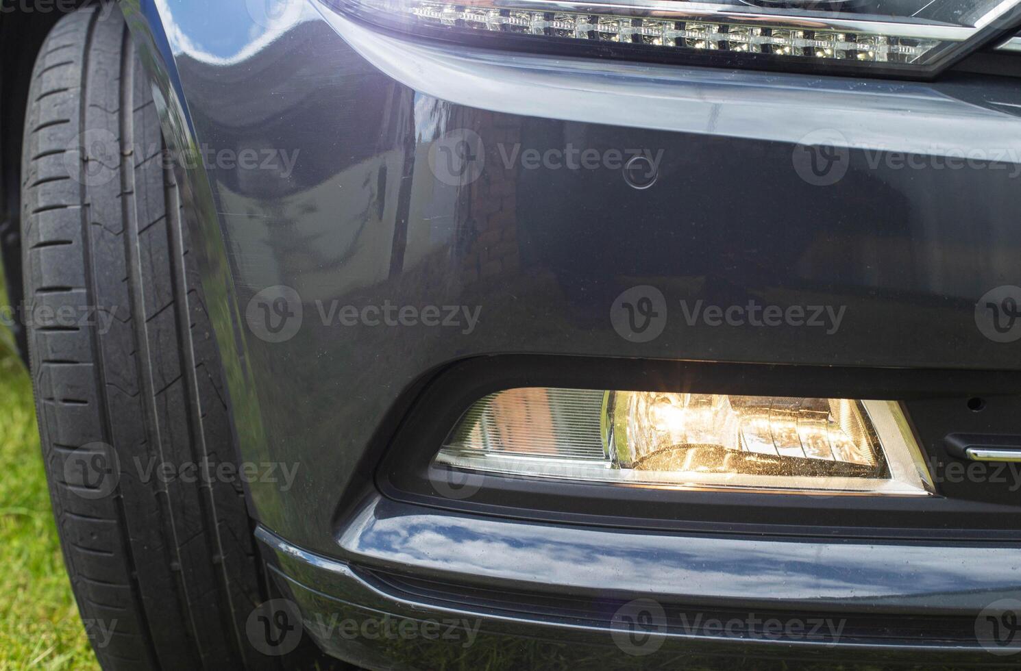 Fog lamp for adaptive illumination of the roadside in the dark when turning the steering wheel. Close-up, technology photo