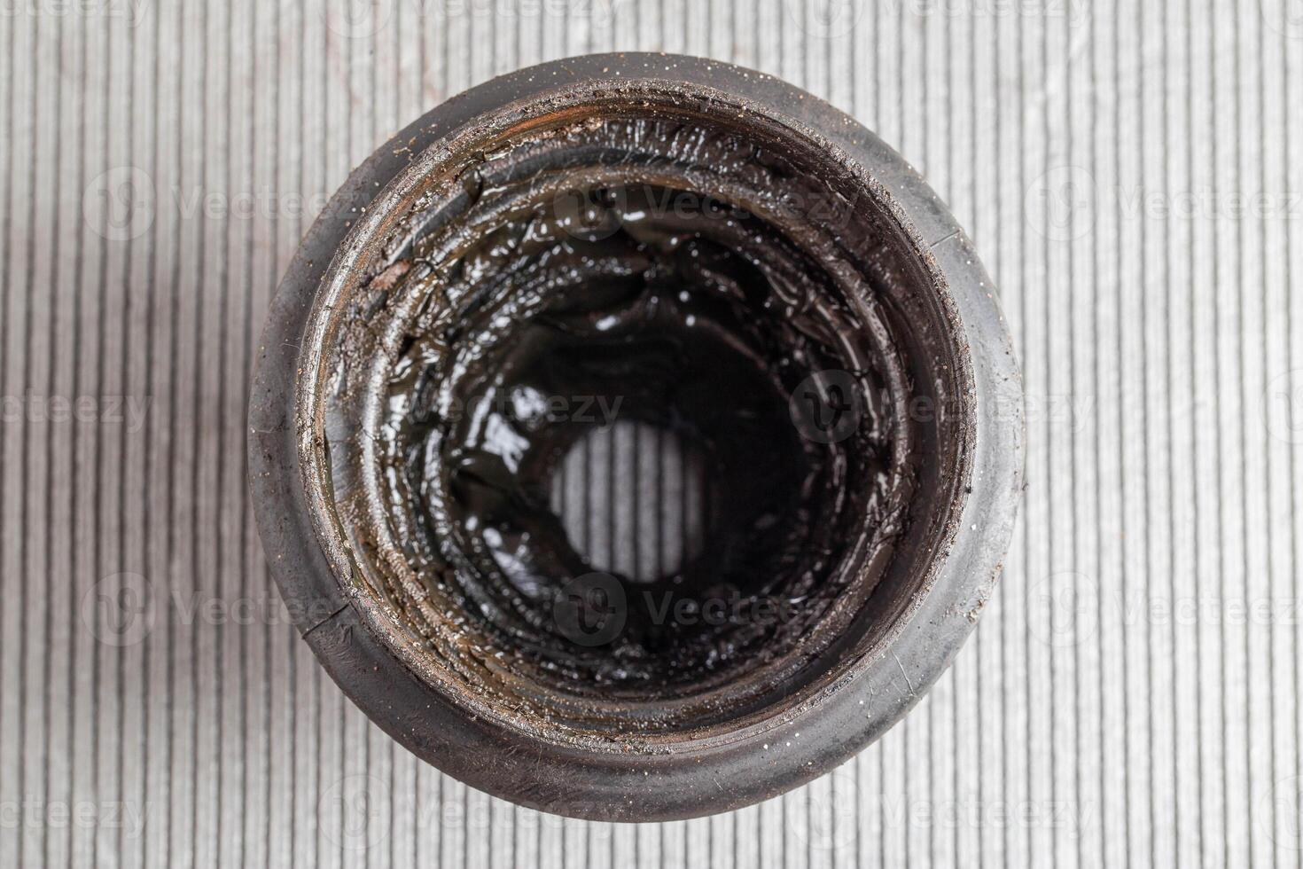Old CV joint boot providing protection and dirt ingress into the constant velocity joint, macro photo