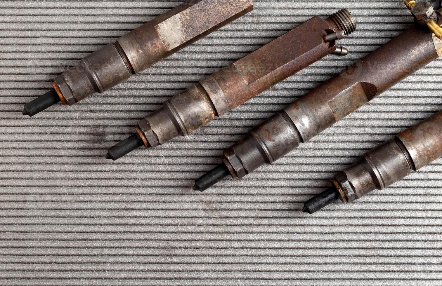 Injectors with diesel engine fuel supply system. Fuel spray. Automotive Part. Copy space for text photo