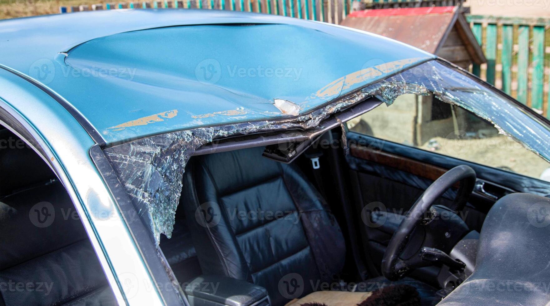 A car after a collision with pedestrians and an accident. Damage to the car body and roof. Emergency state, close-up photo