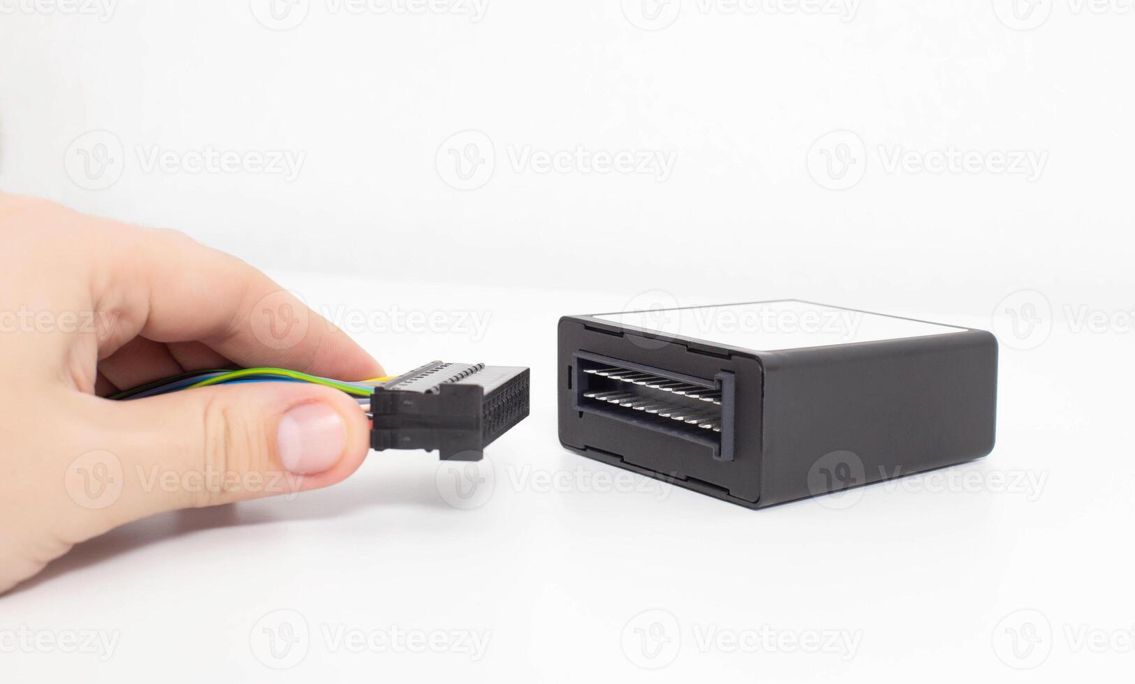 External electronic control unit for automatic transmission on a white background. Control unit for gear shifting, parameter analysis and diagnostics, copy space photo