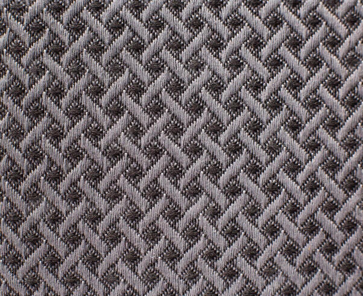 checkered fabric texture on car seats, close-up, background, copy space photo