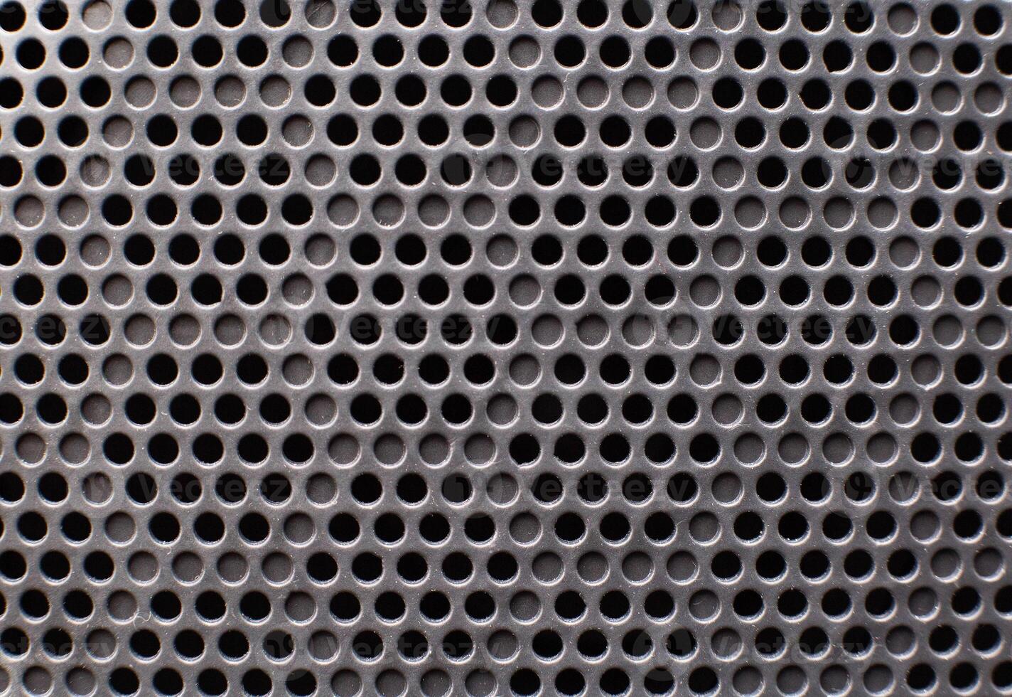 Modern speaker protection grill in a car, background, closeup, copy space photo