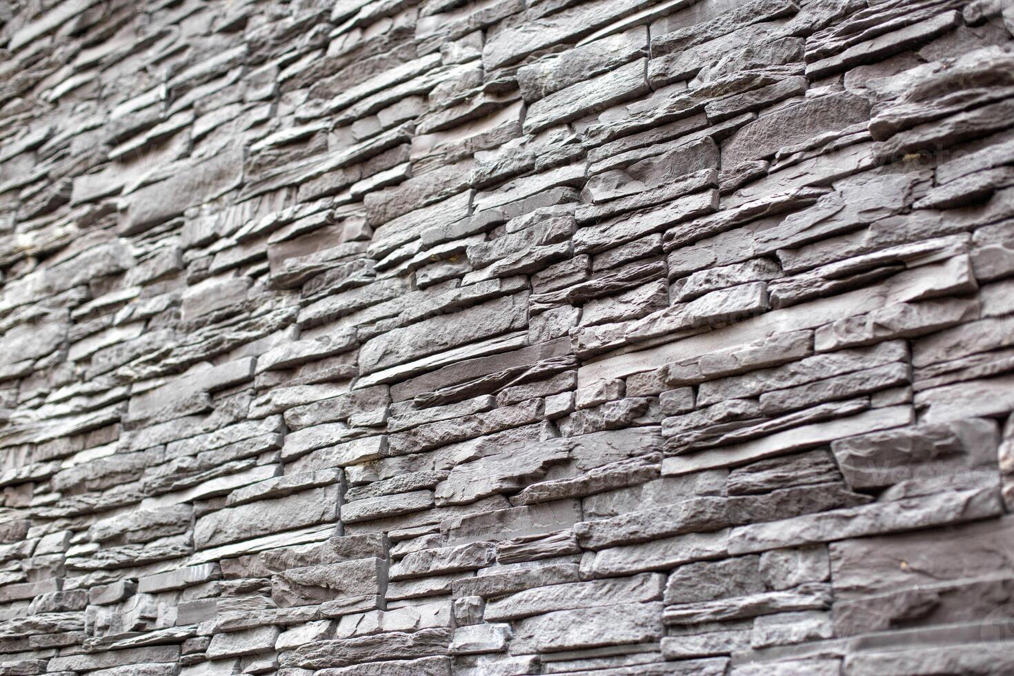 Texture and background of gray stone wall, modern building decoration, architecture photo