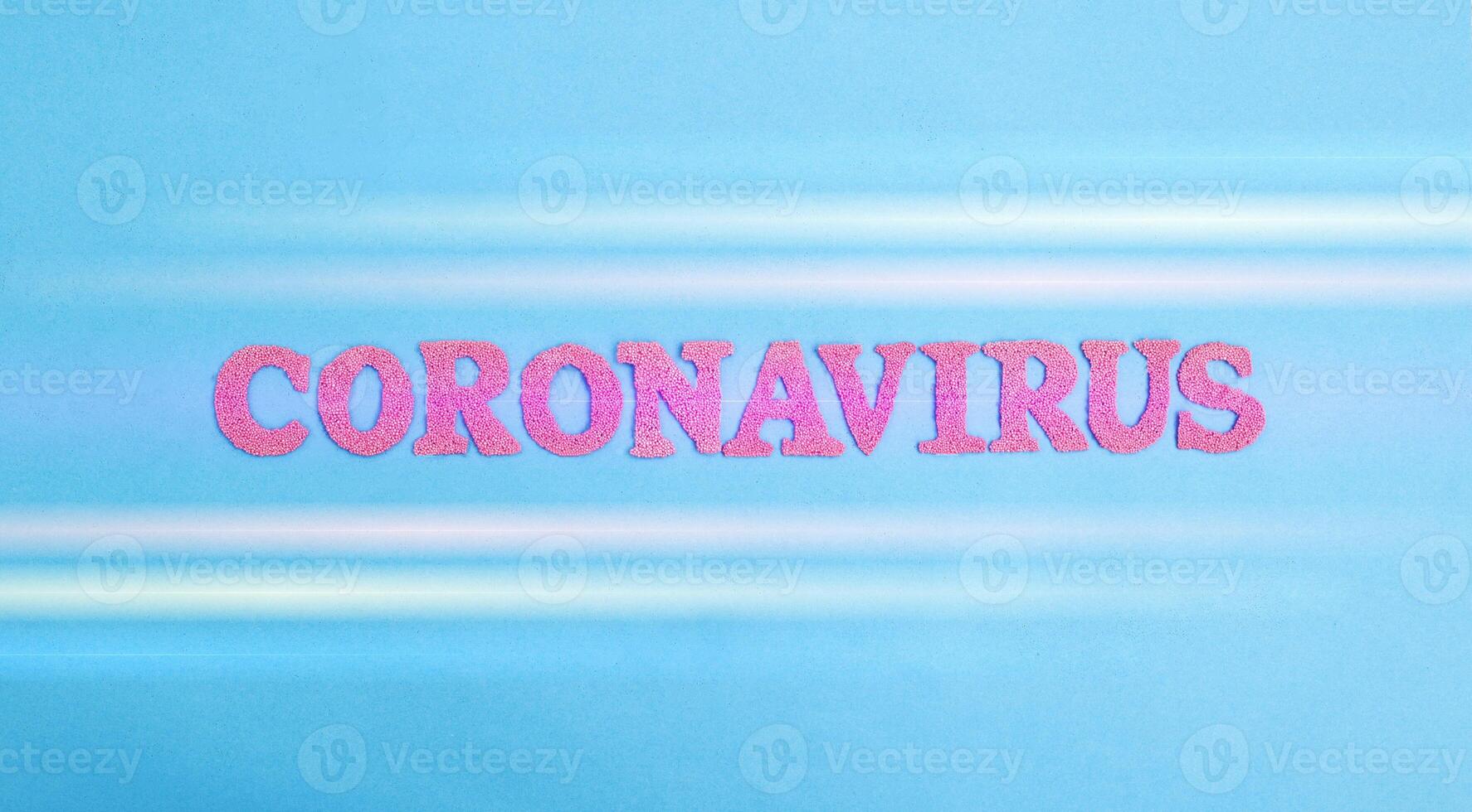 Word coronavirus in red letters on a blue background. Deadly virus concept in China, disease photo