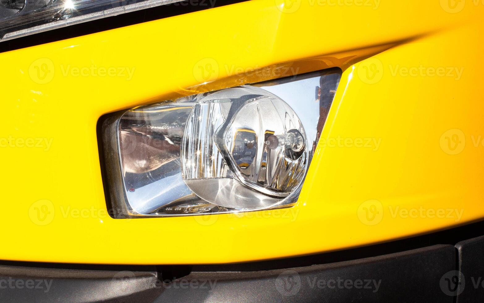 modern bumper fog light of a truck, close-up, headlight photo