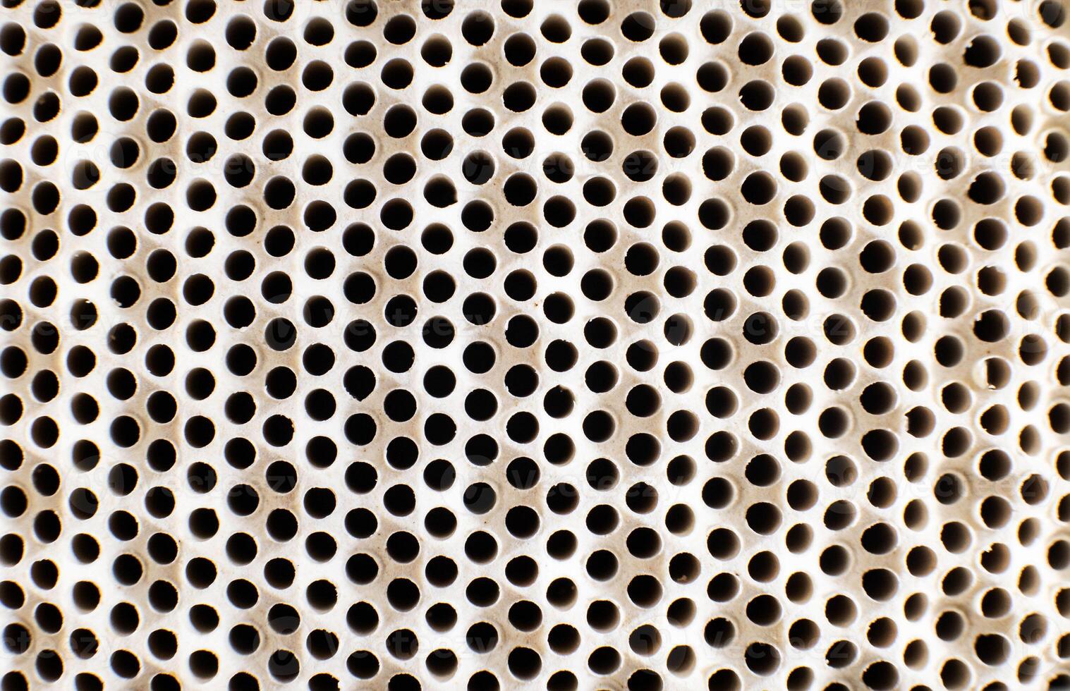 an automotive catalyst that is responsible for cleaning the air in the environment. Background, macro photo