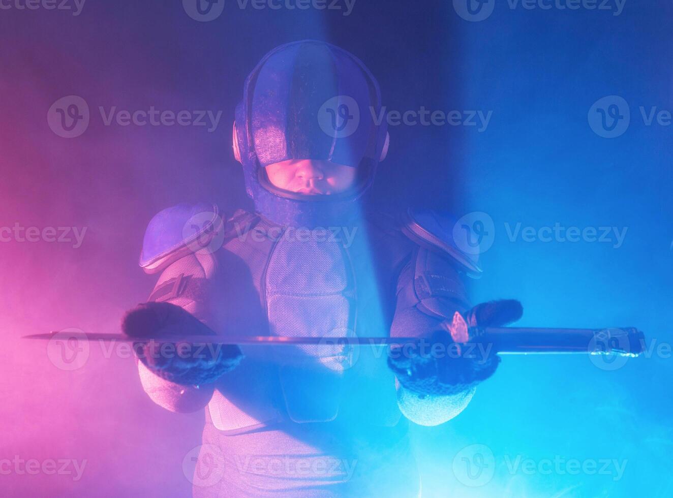 Cyberpunk future concept. Bionic cyborg police officer with short samurai sword stands in dark with smoke, fume. Halfman robot looks at camera. Futuristic science fiction scene. photo