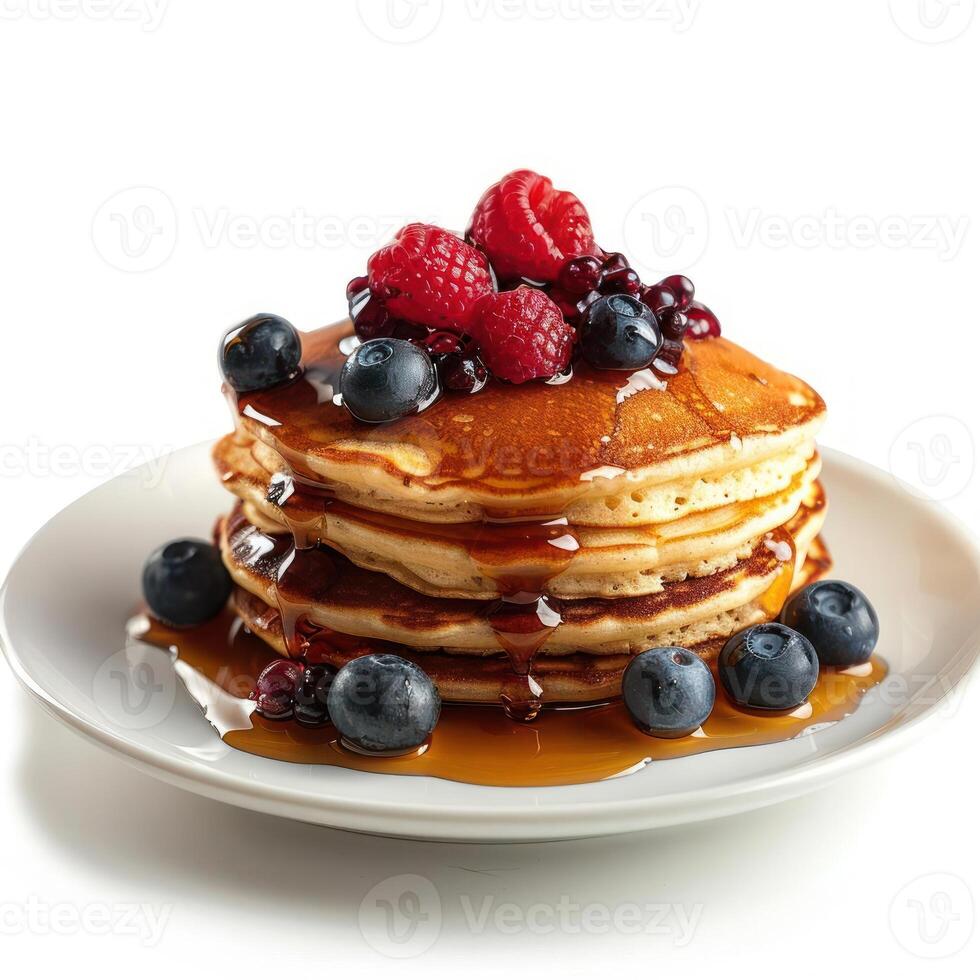 A stack of delicious looking blueberry pancakes topped with fresh berries. photo