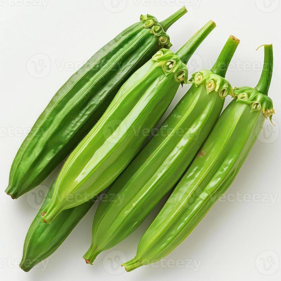 A bunch of unripe green cucumbers photo