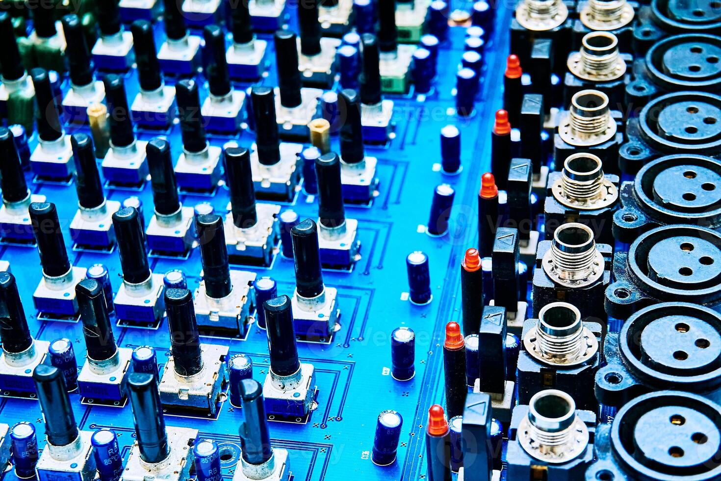 Disassembled music mixer console with inputs for repair, maintenance photo