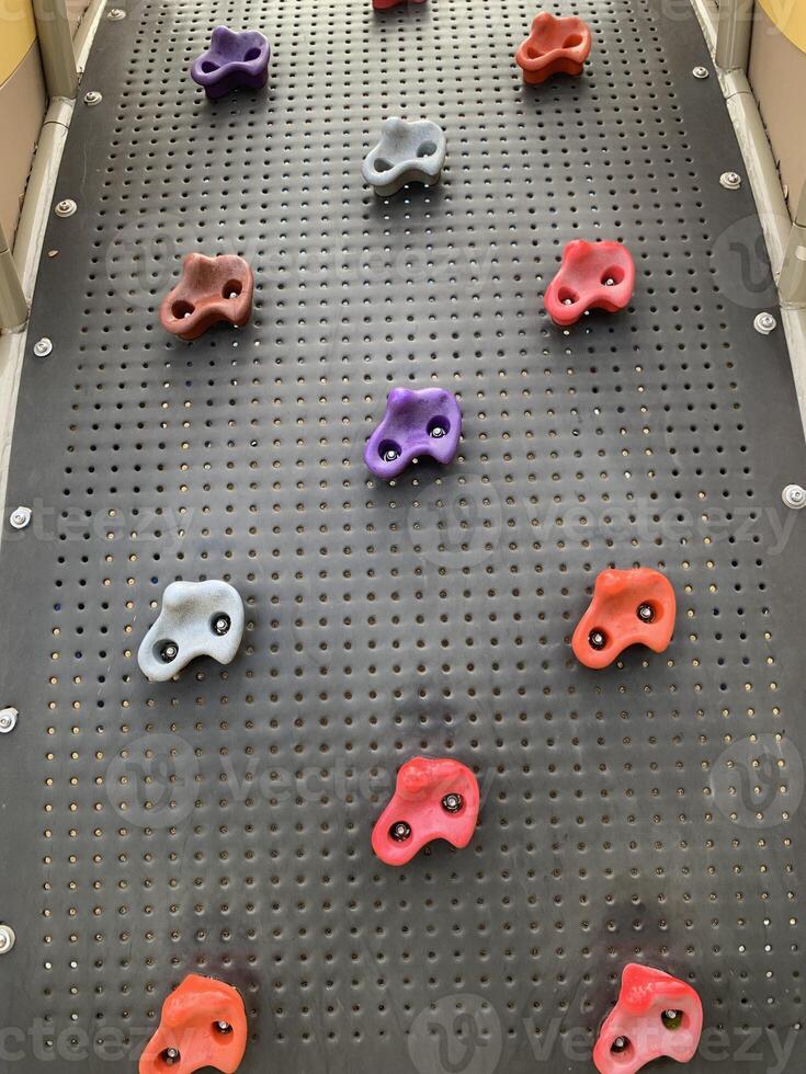 colorful element climbling in gym studio background photo