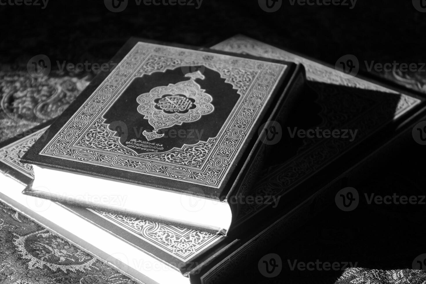 the quran is a holy book that is read by muslims around the world photo