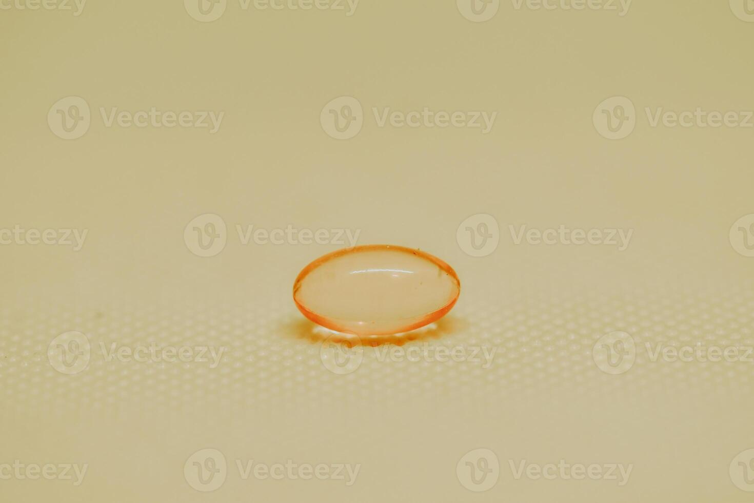 a small orange object sitting on top of a table photo