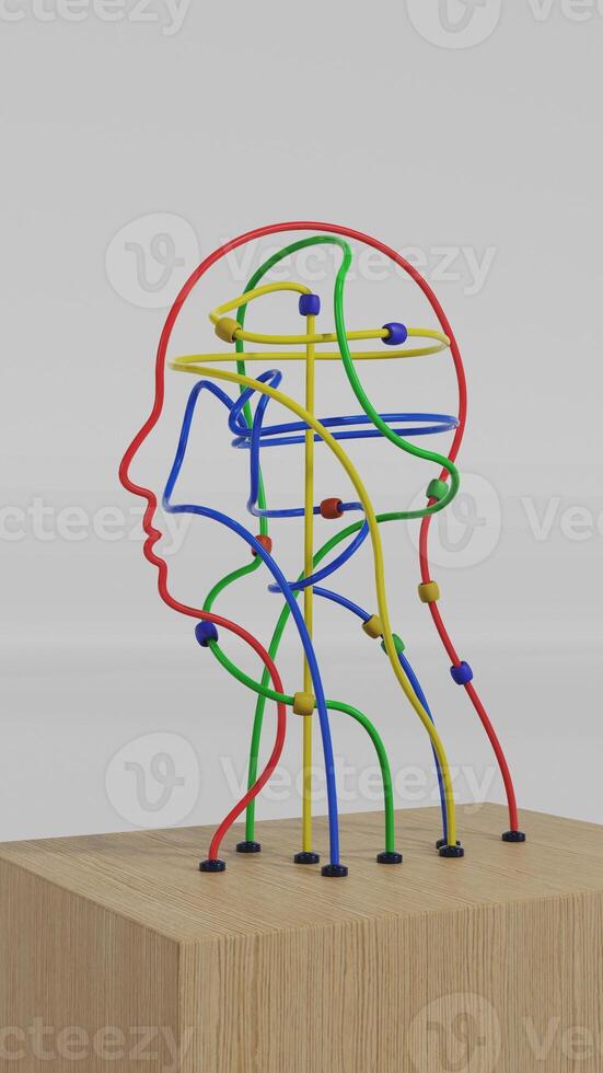a colorful sculpture of a head with a wire coming out of it photo
