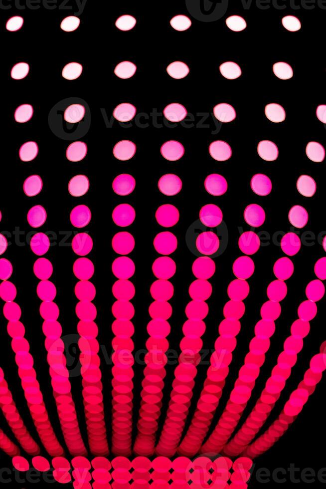 a red and pink lighted up sphere photo