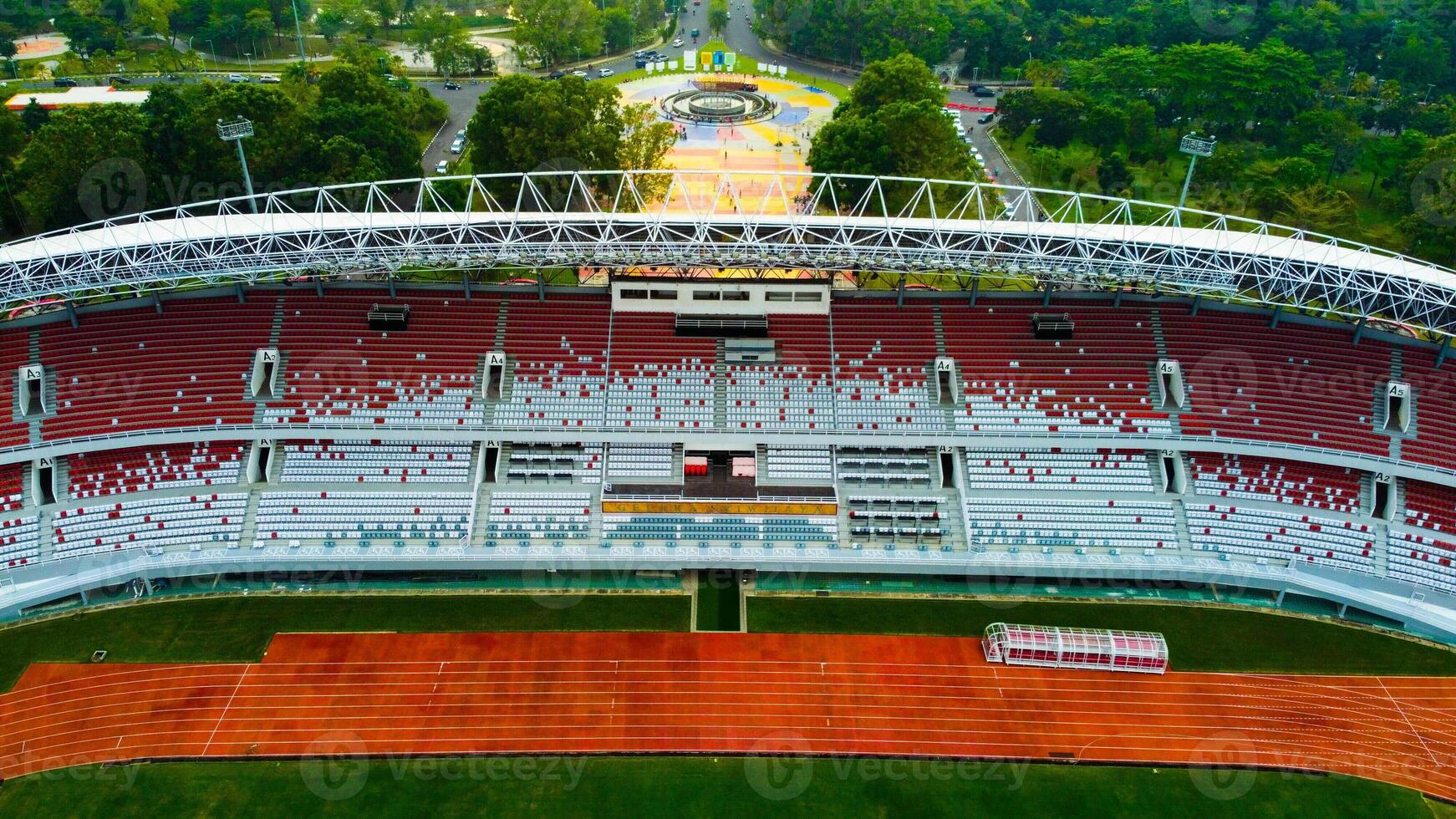 Aerial view of Palembang's largest soccer field, featuring a meticulously maintained green lawn. photo