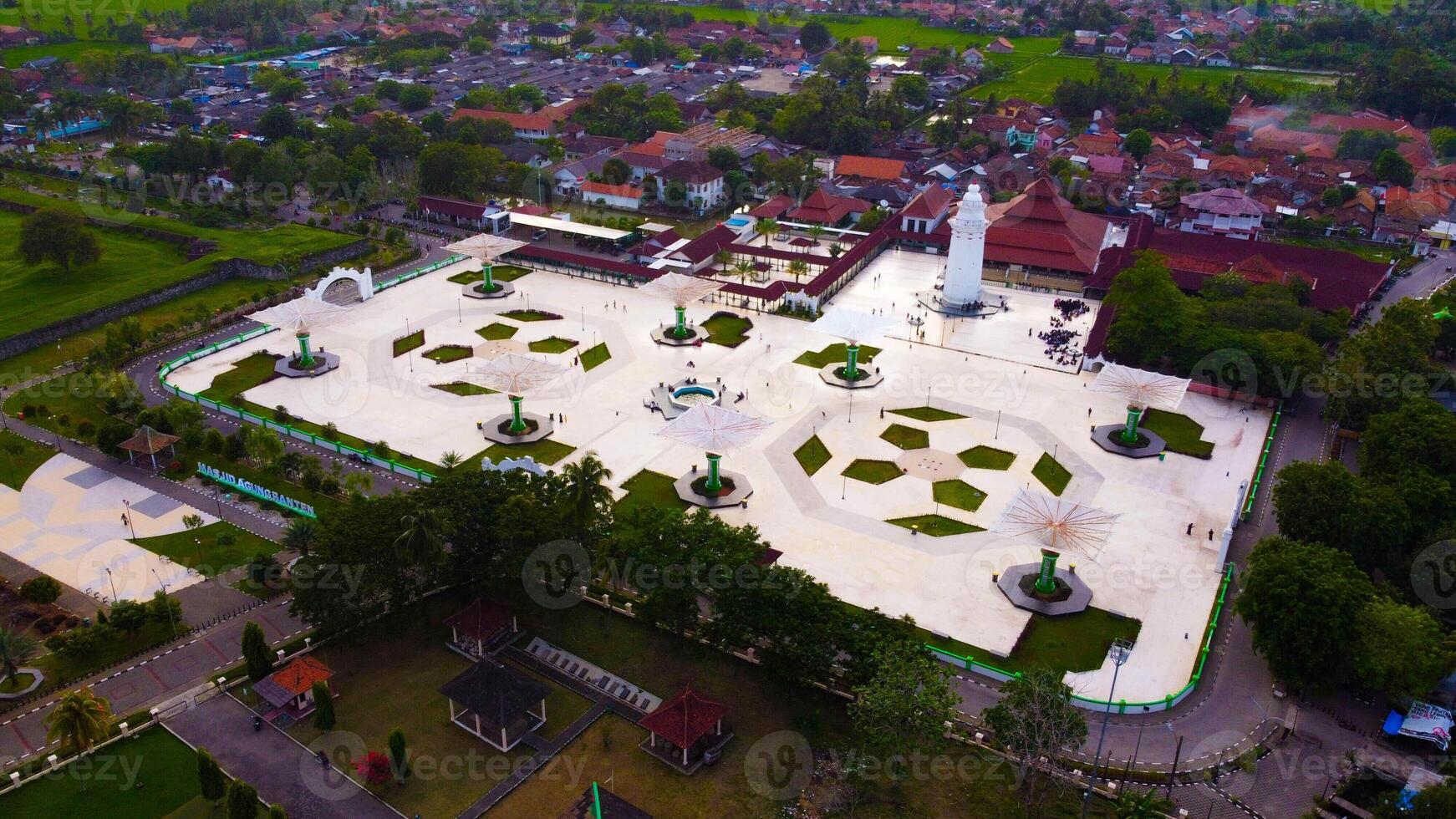The Great Mosque of Banten stands majestically, showcasing rich history and cultural significance. Its intricate architecture and serene atmosphere reflect a deep spiritual heritage. photo