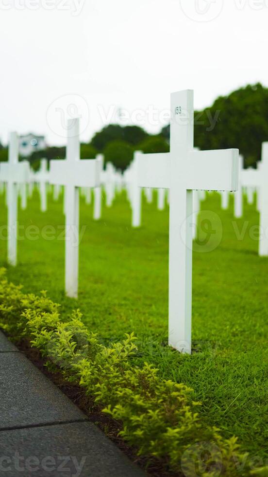 Leuwigajah, the Dutch cemetery, features neatly arranged graves that reflect a sense of peace and respect. photo