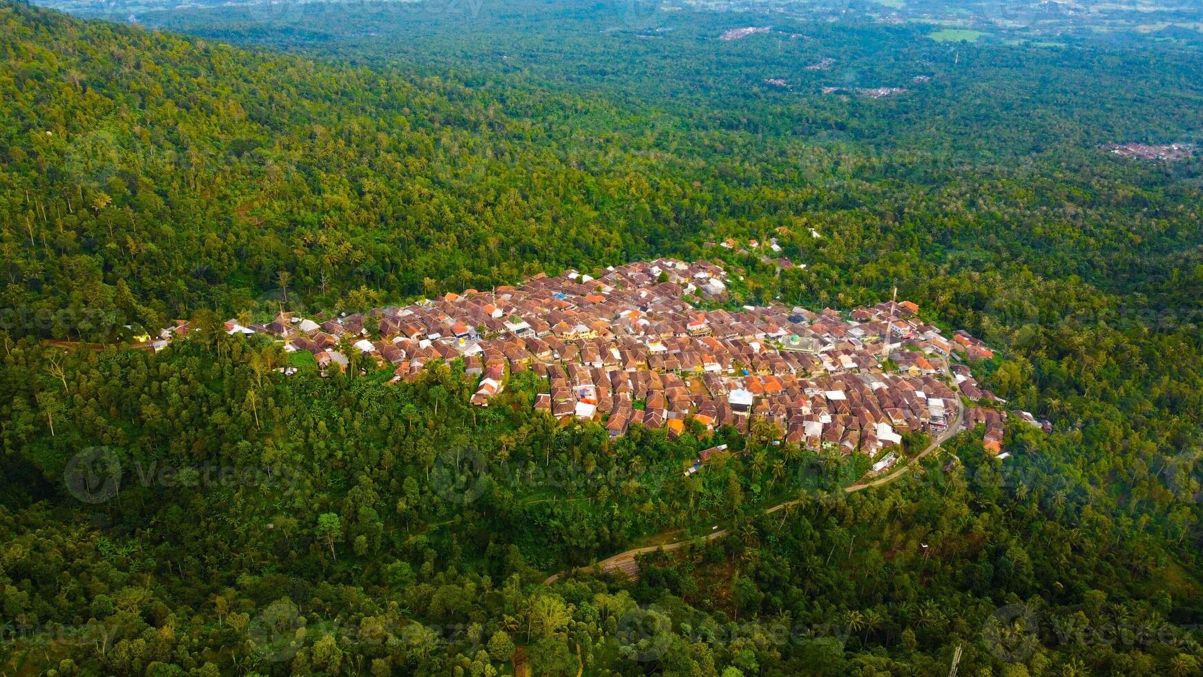 In Pandeglang, Banten, a charming village nestles at the foot of Mount Pandeglang, forming a picturesque triangle. photo
